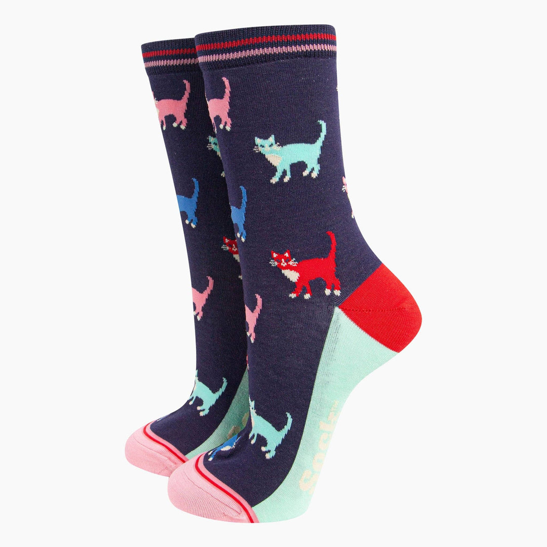 Navy bamboo crew socks with multicolor cat pattern, red heel, and mint toe