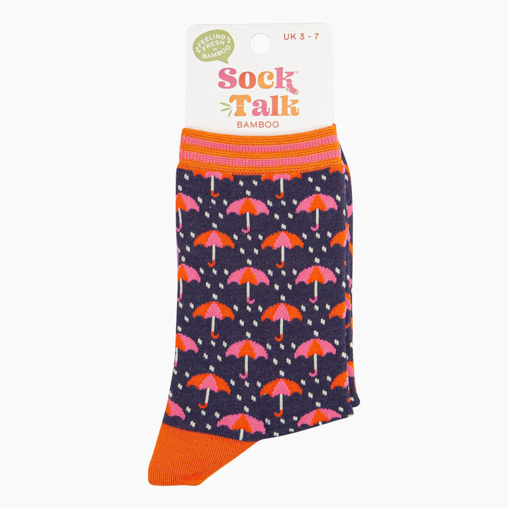Navy blue bamboo ankle socks with pink and orange umbrella pattern, orange cuffs