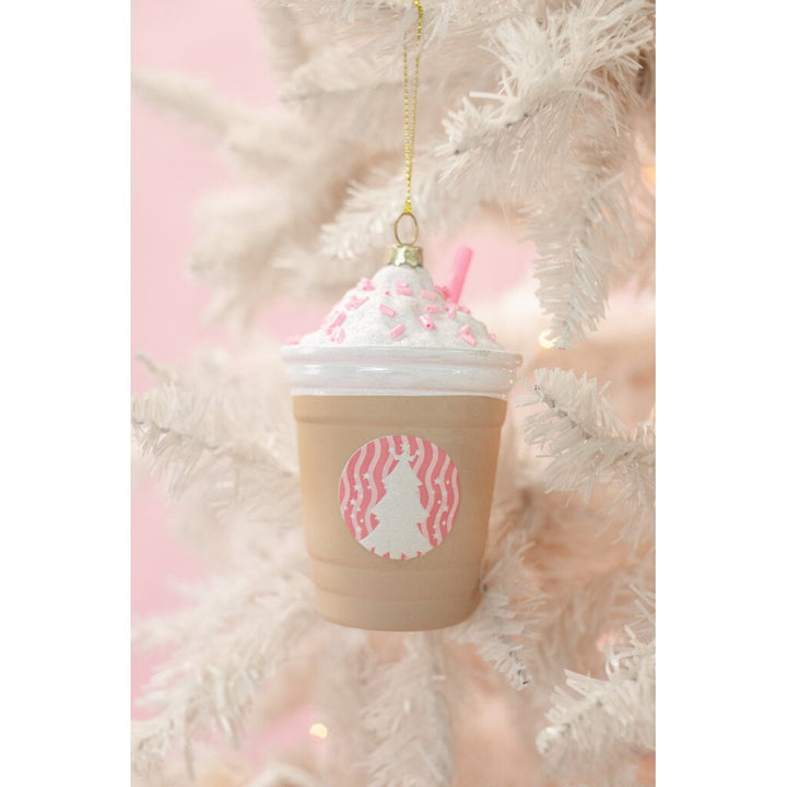 Frappe coffee drink Christmas ornament with whipped cream and pink details hanging on white tree
