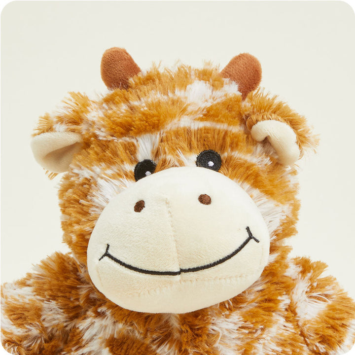 Warmies plush giraffe stuffed animal with orange spotted pattern and smiling face