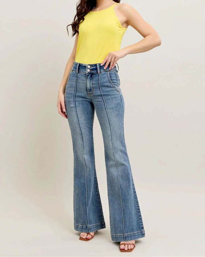 Woman wearing Judy Blue high waisted trouser flare jeans with yellow tank top