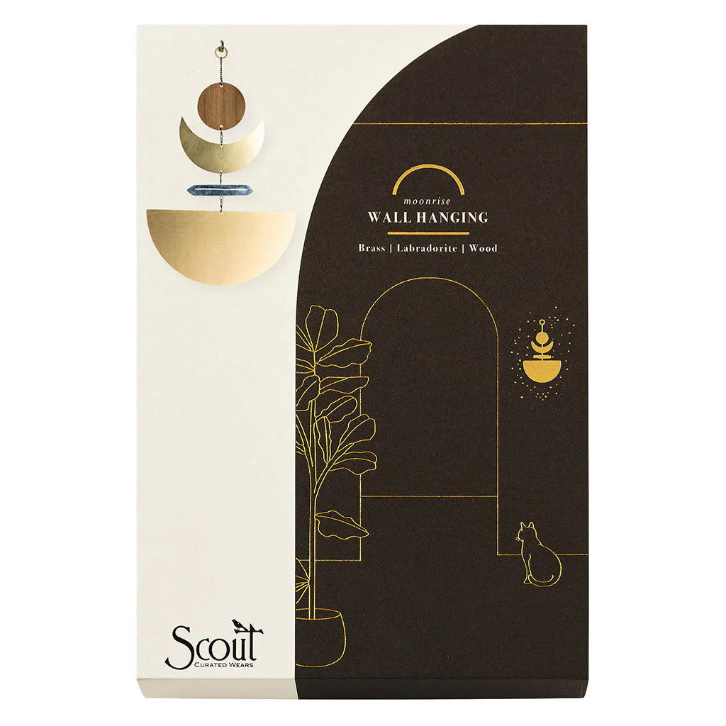 Scout Moonrise wall hanging with geometric wooden and brass shapes in earth tones
