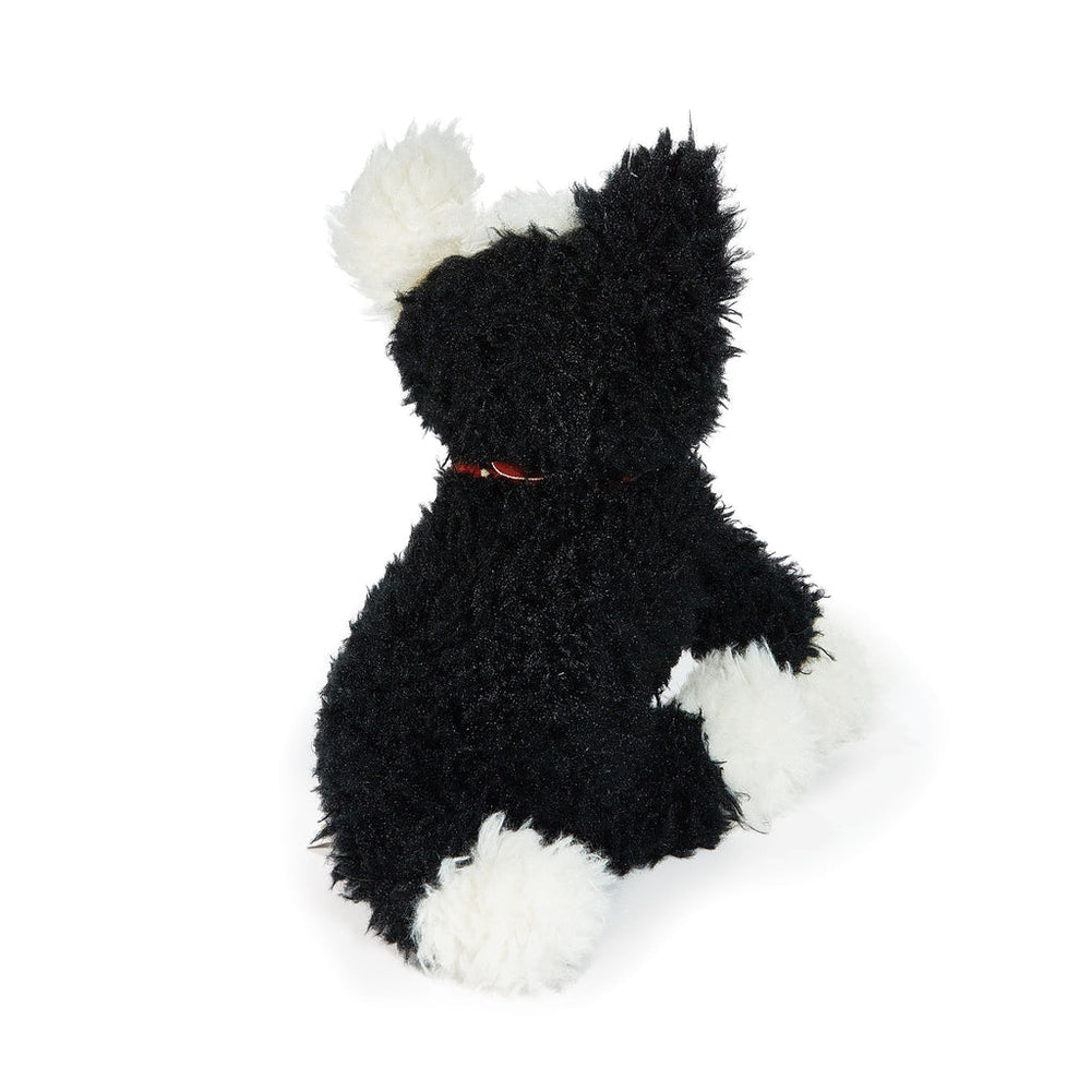 Black and white plush farm dog stuffed animal with red collar sitting upright