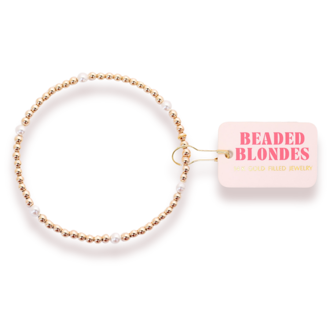 Beaded Blondes Madi Pearl Bracelet featuring gold beads and white pearl accents on display card