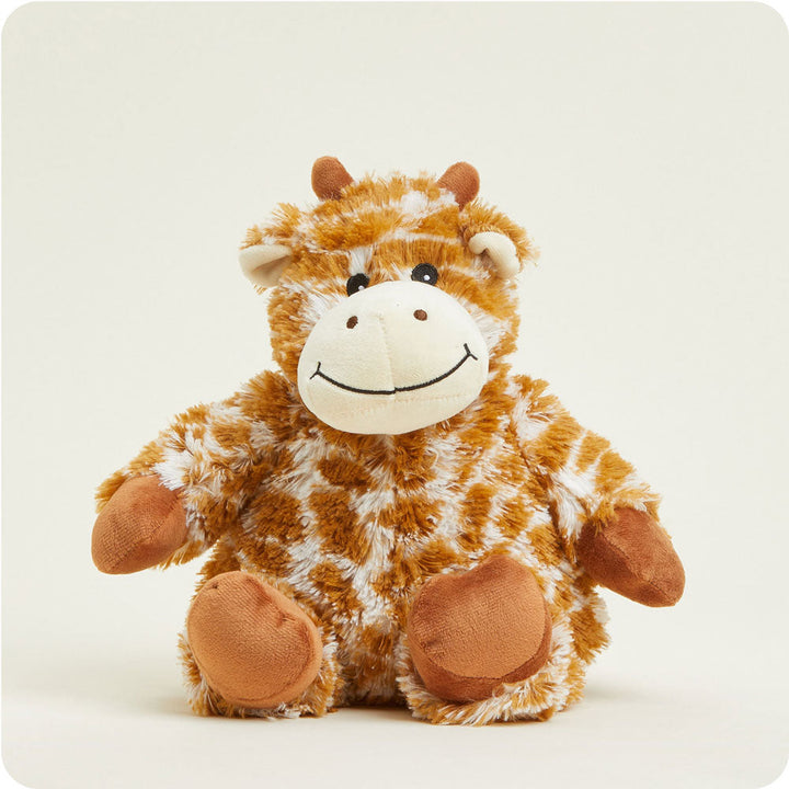 Warmies plush giraffe stuffed animal with orange and white pattern, smiling face