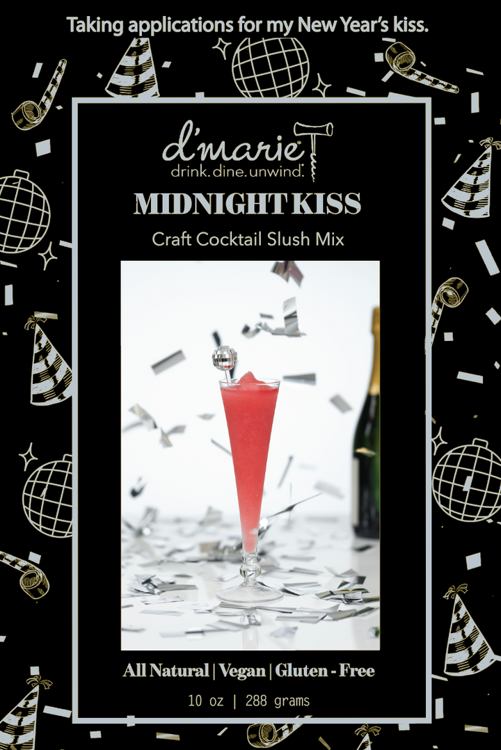 D'Marie Midnight Kiss craft cocktail slush mix in red drink with New Year's party styling