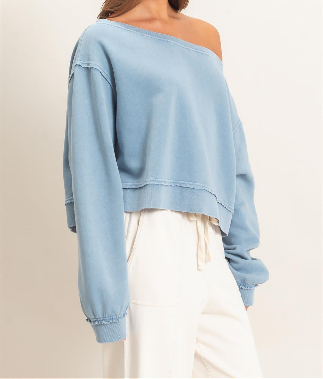 HYFVE raw edge off-the-shoulder cropped sweatshirt in dusty blue with long sleeves