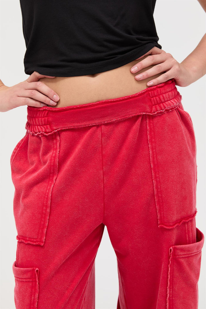 Red mineral wash wide leg cargo pants with elastic waistband and side pockets