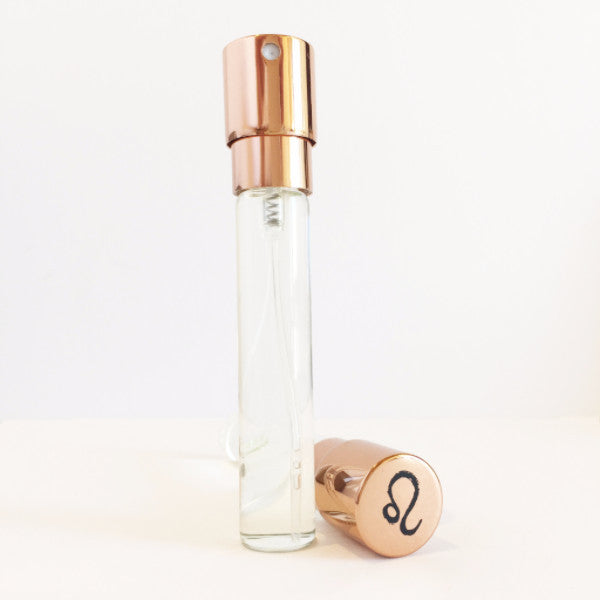 Zodica Perfumery Twist &amp; Spritz rollerball with rose gold cap and Leo zodiac symbol