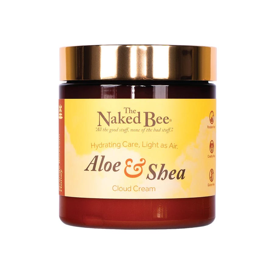 The Naked Bee Aloe & Shea Cloud Cream in amber glass jar with rose gold lid