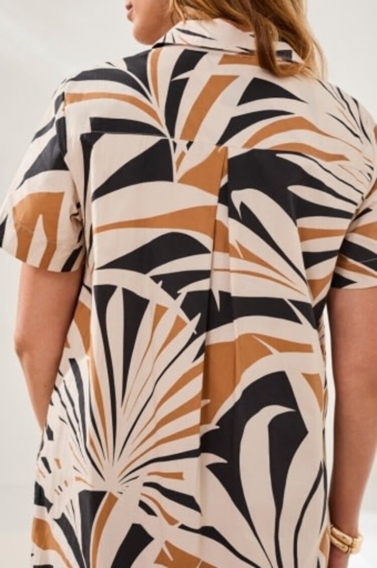 Tribal short sleeve half placket dress in abstract tropical leaf print on canvas background