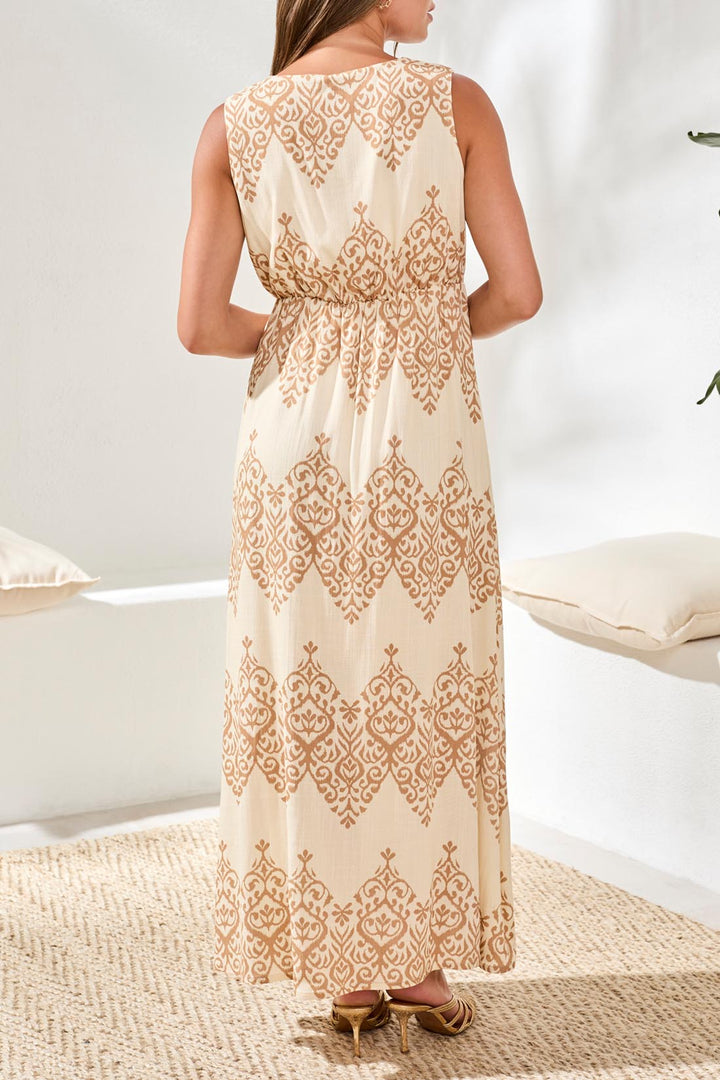 Sleeveless maxi dress with geometric brown pattern on canvas background, cinched waist