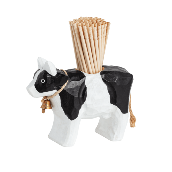 Black and white Holstein cow-shaped wooden toothpick holder with bell around neck