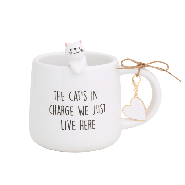 White ceramic mug with small cat figure and humorous cat-themed text