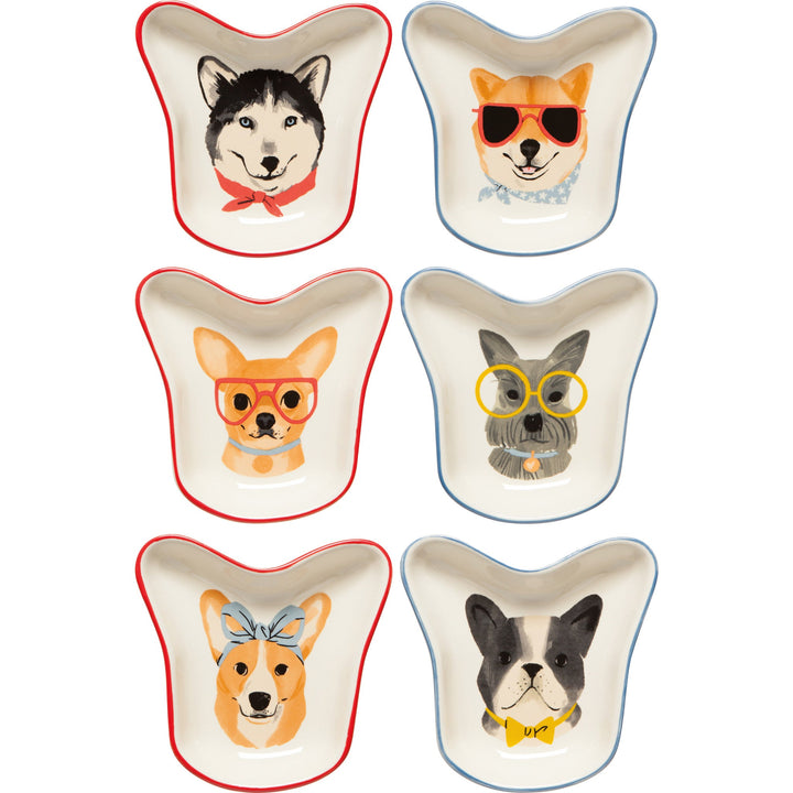 Six ceramic pinch bowls featuring illustrated dogs with accessories in Uptown Dogs pattern