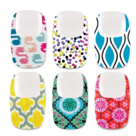 Six lighted pocket magnifiers in colorful patterns including dots, geometric, and floral designs